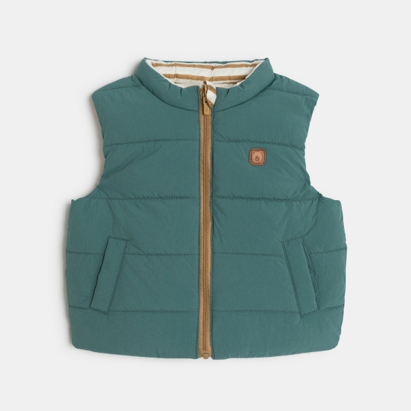 سترة بدون أكمام بوجهين باللون الأخضر للأطفال الصغار.